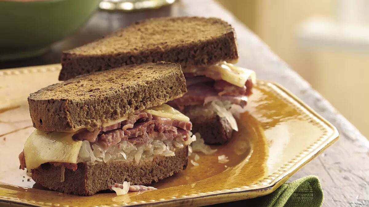 slow-cooker-corned-beef-reuben-sandwiches-recipe